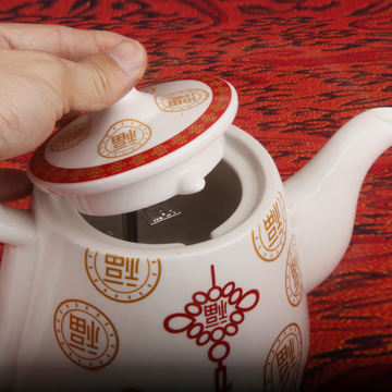中国结陶瓷电热水壶不锈钢底盘加热茶具烧水壶自动断电热水壶